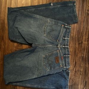 Some distress on pockets and bottoms, 38 length